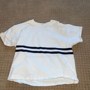 Brandy Melville 100% cotton top with navy stripe. Size small.